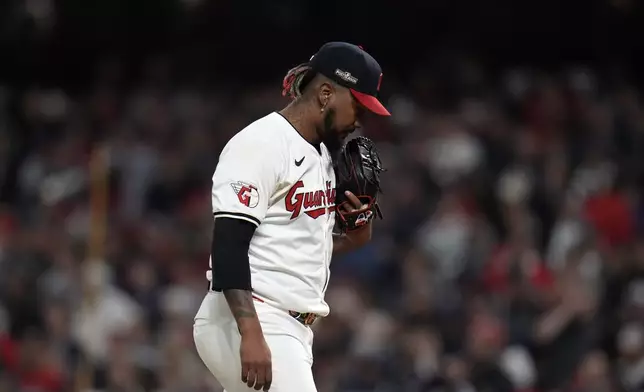 Cleveland Guardians relief pitcher Emmanuel Clase reacts after giving up a home run against the New York Yankees during the eighth inning in Game 3 of the baseball AL Championship Series Thursday, Oct. 17, 2024, in Cleveland.(AP Photo/Jeff Roberson)