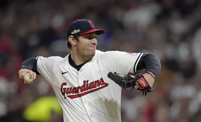 Cleveland Guardians starting pitcher Gavin Williams throws against the New York Yankees during the first inning in Game 4 of the baseball AL Championship Series Friday, Oct. 18, 2024, in Cleveland. (AP Photo/Sue Ogrocki)