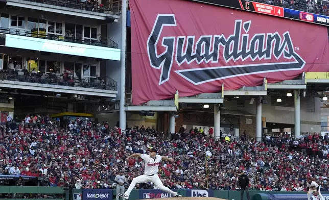 Cleveland Guardians starting pitcher Matthew Boyd throws against the New York Yankees during the fourth inning in Game 3 of the baseball AL Championship Series Thursday, Oct. 17, 2024, in Cleveland.(AP Photo/Godofredo Vásquez )