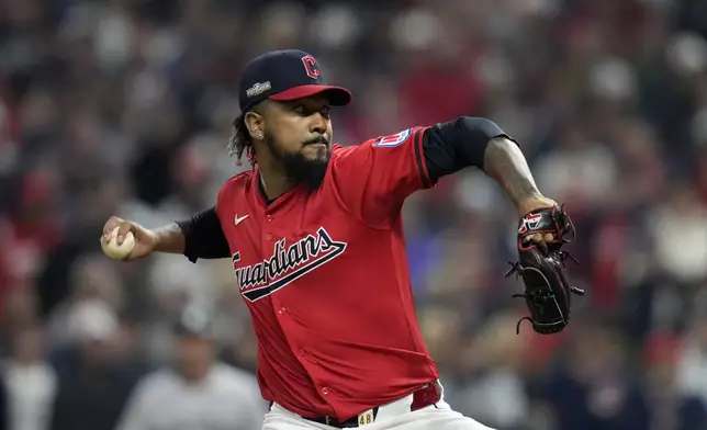 Cleveland Guardians pitcher Emmanuel Clase throws against the New York Yankees during the ninth inning in Game 5 of the baseball AL Championship Series Saturday, Oct. 19, 2024, in Cleveland. (AP Photo/Sue Ogrocki)