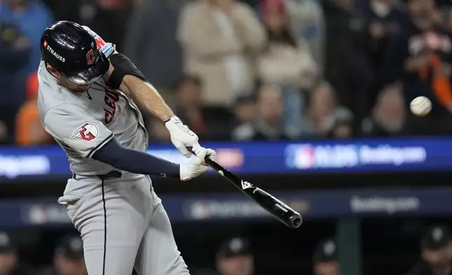 Cleveland Guardians' David Fry hits a two-run home run in the seventh inning during Game 4 of a baseball American League Division Series against the Detroit Tigers, Thursday, Oct. 10, 2024, in Detroit.(AP Photo/Paul Sancya)