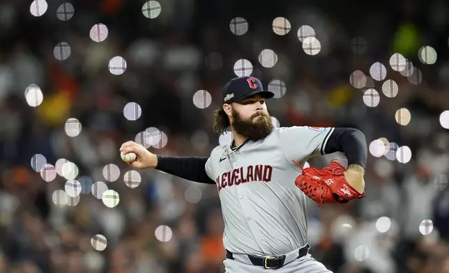 Cleveland Guardians pitcher Hunter Gaddis throws against the Detroit Tigers in the seventh inning during Game 4 of a baseball American League Division Series, Thursday, Oct. 10, 2024, in Detroit. (AP Photo/Carlos Osorio)