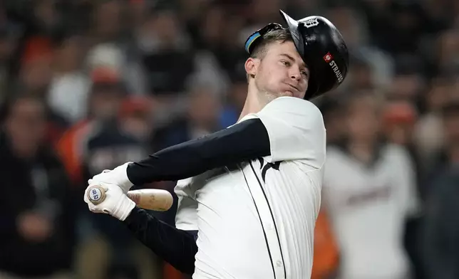 Detroit Tigers' Trey Sweeney strikes out in the eighth inning during Game 4 of a baseball American League Division Series against the Cleveland Guardians, Thursday, Oct. 10, 2024, in Detroit. (AP Photo/Paul Sancya)