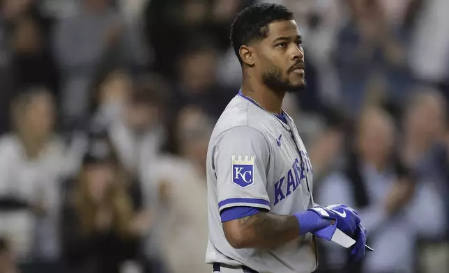 Kansas City Royals third base Maikel Garcia reacts after striking out to end the top of the eighth inning against the New York Yankees during Game 1 of the American League baseball division series, Saturday, Oct. 5, 2024, in New York. (AP Photo/Adam Hunger)