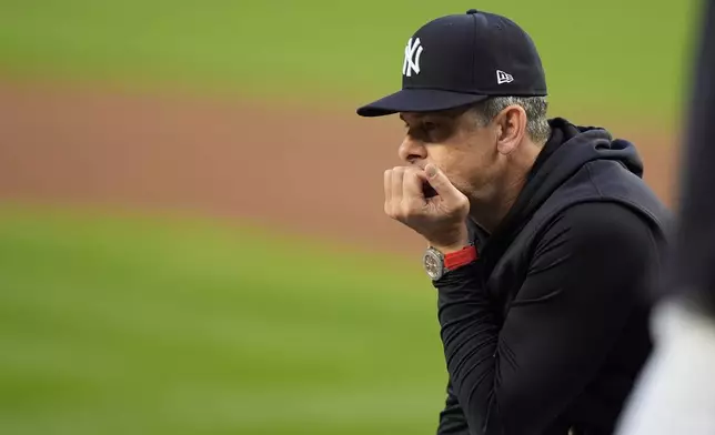 New York Yankees manager Aaron Boone watches his players during a baseball workout, Friday, Oct 4, 2024, in New York, in preparation for the American League Division Series against the Kansas City Royals. (AP Photo/Frank Franklin II)