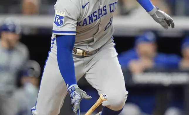 Kansas City Royals outfielder Tommy Pham (22) heads for first base on an RBI single against the New York Yankees during the fourth inning of Game 2 of the American League baseball playoff series, Monday, Oct. 7, 2024, in New York. (AP Photo/Frank Franklin II)