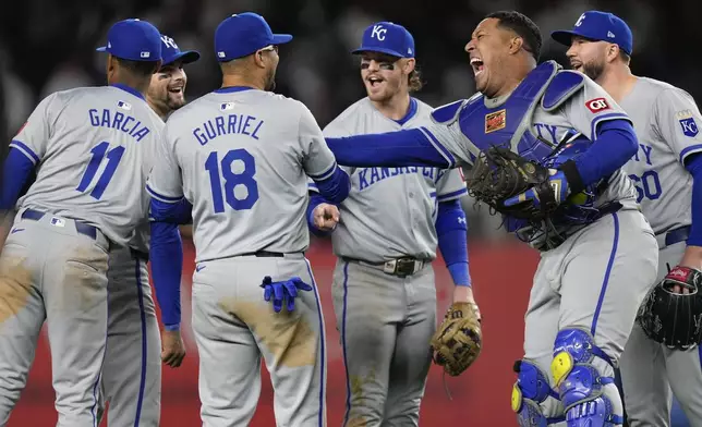 The Kansas City Royals celebrate after defeating the New York Yankees in Game 2 of the American League baseball playoff series, Monday, Oct. 7, 2024, in New York. (AP Photo/Seth Wenig)