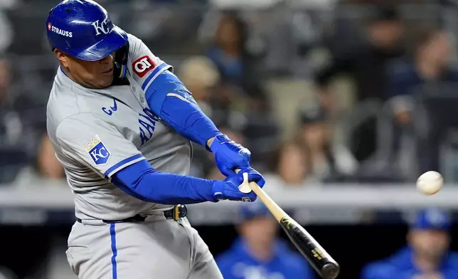 Kansas City Royals' Salvador Perez (13) connects for a solo home run against the New York Yankees during the fourth inning of Game 2 of the American League baseball playoff series, Monday, Oct. 7, 2024, in New York. (AP Photo/Frank Franklin II)