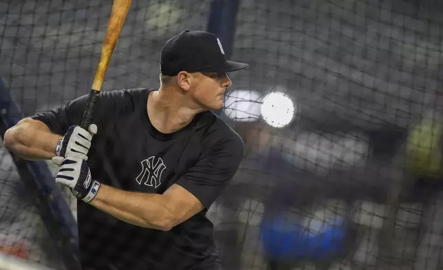 New York Yankees' DJ LeMahieu takes batting practice during a baseball workout, Friday, Oct 4, 2024, in New York, in preparation for the American League Division Series against the Kansas City Royals. (AP Photo/Frank Franklin II)