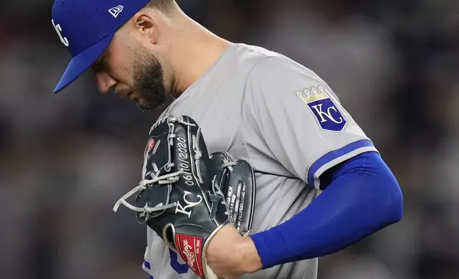 The date 06/10/2020 is displayed on Kansas City Royals pitcher Lucas Erceg's (60) glove during the ninth inning of Game 2 of the American League baseball playoff series against the New York Yankees, Monday, Oct. 7, 2024, in New York. (AP Photo/Seth Wenig)