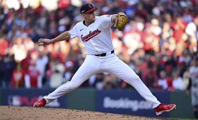 Cleveland Guardians' Cade Smith pitches in the fifth inning during Game 2 of baseball's AL Division Series against the Detroit Tigers, Monday, Oct. 7, 2024, in Cleveland. (AP Photo/David Dermer)