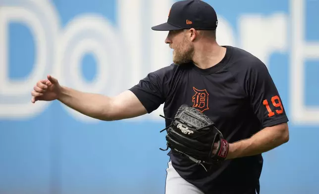 Detroit Tigers' Will Vest warms up during a baseball workout in Cleveland, Friday, Oct. 4, 2024, in preparation for the American League Division Series against the Cleveland Guardians. (AP Photo/Sue Ogrocki)