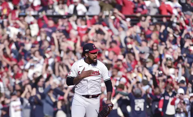 Cleveland Guardians' Emmanuel Clase celebrates after the Guardians defeated the Detroit Tigers in Game 5 of baseball's American League Division Series, Saturday, Oct. 12, 2024, in Cleveland. (AP Photo/Phil Long)