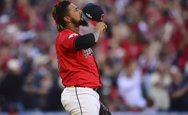 Cleveland Guardians' Emmanuel Clase gestures after the Cleveland Guardians defeated the Detroit Tigers in Game 1 of baseball's AL Division Series, Saturday, Oct. 5, 2024, in Cleveland. (AP Photo/David Dermer)