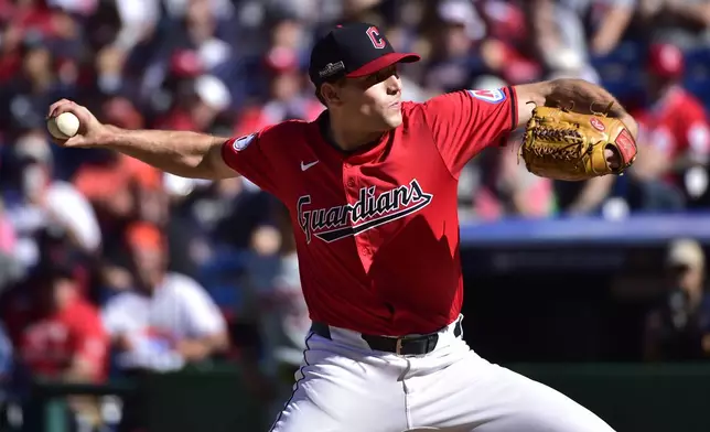 Cleveland Guardians' Cade Smith pitches in the sixth inning during Game 1 of baseball's AL Division Series against the Detroit Tigers, Saturday, Oct. 5, 2024, in Cleveland. (AP Photo/Phil Long)