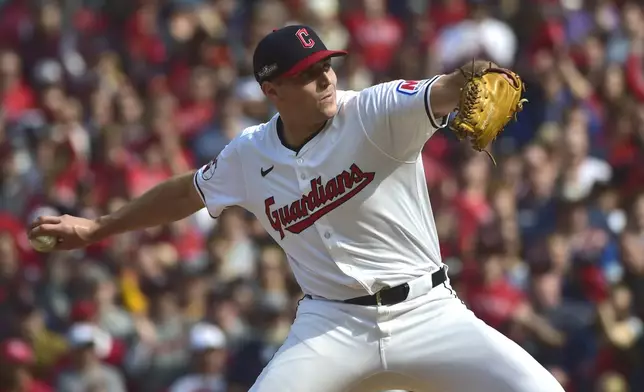 Cleveland Guardians' Cade Smith pitches in the third inning during Game 5 of baseball's American League Division Series against the Detroit Tigers, Saturday, Oct. 12, 2024, in Cleveland. (AP Photo/Phil Long)