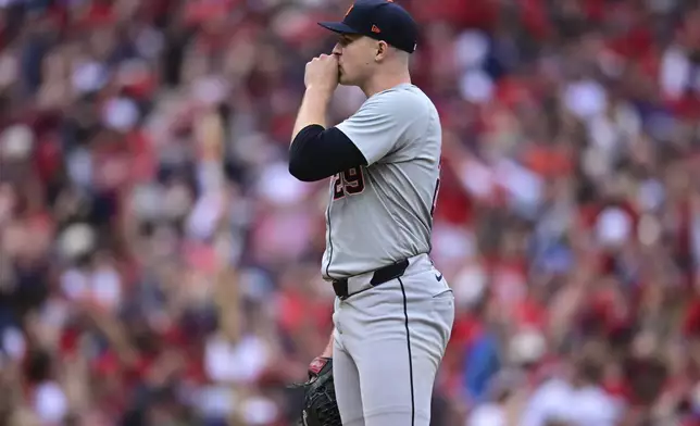 Detroit Tigers starting pitcher Tarik Skubal stands on the mound after giving up a grand slam to Cleveland Guardians' Lane Thomas in the fifth inning during Game 5 of baseball's American League Division Series, Saturday, Oct. 12, 2024, in Cleveland. (AP Photo/David Dermer)