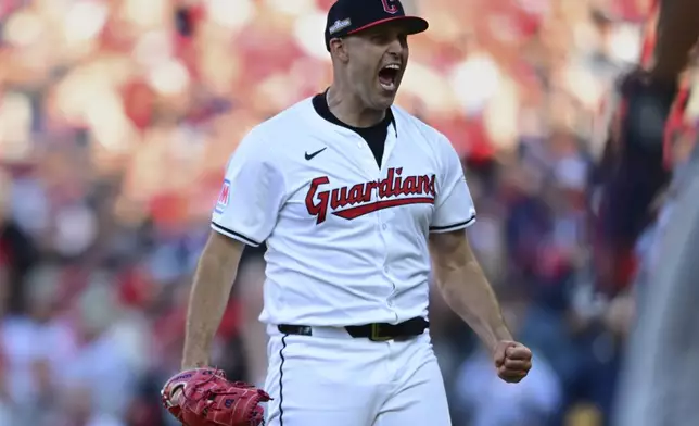 Cleveland Guardians starting pitcher Matthew Boyd shouts as he walks off the mound in the fourth inning during Game 2 of baseball's AL Division Series against the Detroit Tigers, Monday, Oct. 7, 2024, in Cleveland. (AP Photo/David Dermer)