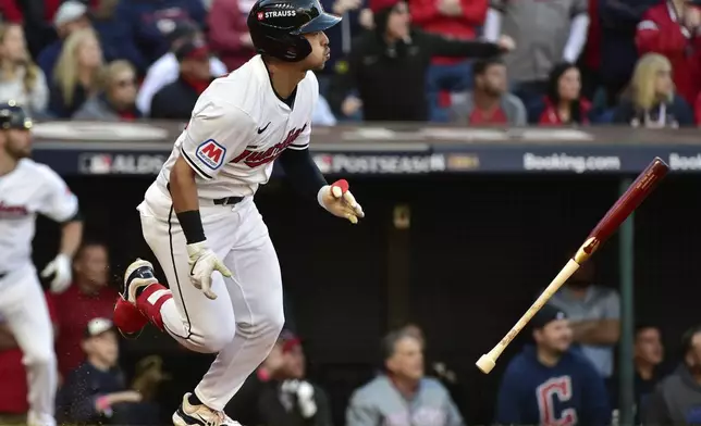 Cleveland Guardians' Steven Kwan watches his single in the sixth inning during Game 2 of baseball's AL Division Series against the Detroit Tigers, Monday, Oct. 7, 2024, in Cleveland. (AP Photo/Phil Long)