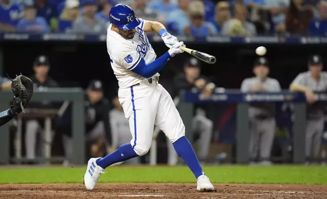 Kansas City Royals' Tommy Pham singles during the fifth inning in Game 4 of an American League Division baseball playoff series against the New York Yankees Thursday, Oct. 10, 2024, in Kansas City, Mo. (AP Photo/Charlie Riedel)