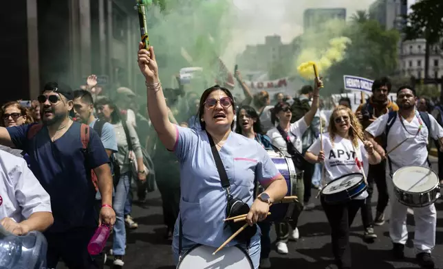 Public hospital workers protest for higher salaries next to Plaza de Mayo in Buenos Aires, Argentina, Tuesday, Oct. 8, 2024. (AP Photo/Rodrigo Abd)