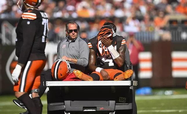 Cleveland Browns quarterback Deshaun Watson (4) is carted off the field after being injured in the first half of an NFL football game against the Cincinnati Bengals, Sunday, Oct. 20, 2024, in Cleveland. (AP Photo/David Richard)