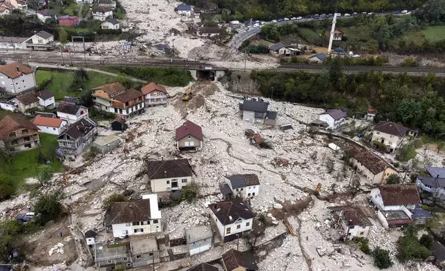 An aerial view shows the area destroyed by a landslide in Donja Jablanica, Bosnia, Saturday, Oct. 5, 2024. (AP Photo/Armin Durgut)