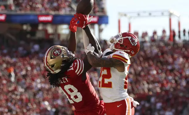 San Francisco 49ers wide receiver Chris Conley (18) cannot catch a pass while being defended by Kansas City Chiefs cornerback Trent McDuffie during the second half of an NFL football game in Santa Clara, Calif., Sunday, Oct. 20, 2024. (AP Photo/Jed Jacobsohn)