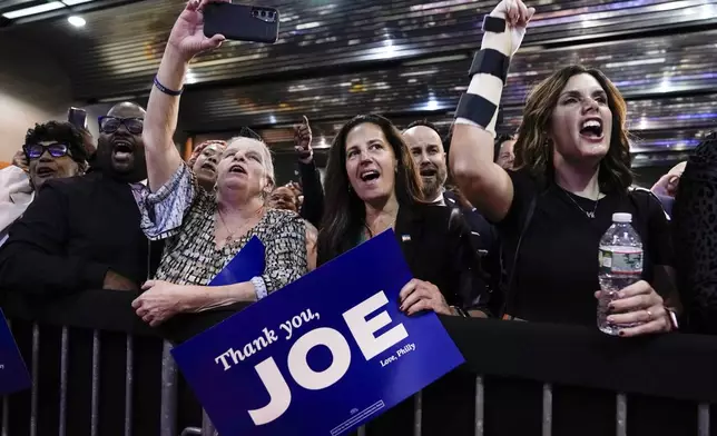 Supporters listen as President Joe Biden speaks at a political event in Philadelphia, Tuesday, Oct. 15, 2024. (AP Photo/Jose Luis Magana)