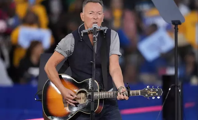 Bruce Springsteen performs at a campaign rally supporting Democratic presidential nominee Vice President Kamala Harris, Thursday, Oct. 24, 2024, in Clarkston, Ga. (AP Photo/Mike Stewart)