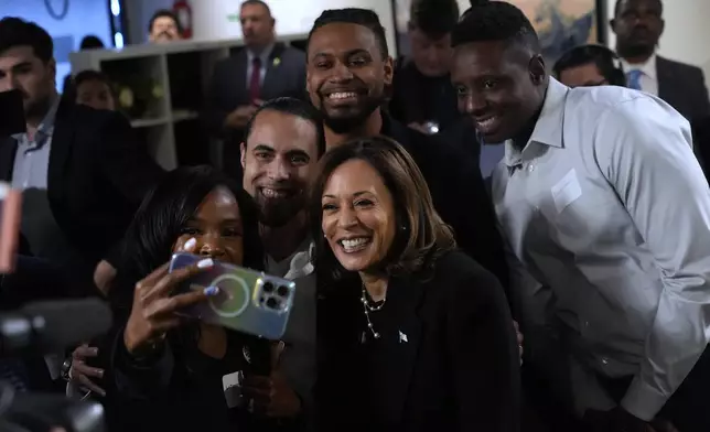 Democratic presidential nominee Vice President Kamala Harris poses for a photo as she visits Norwest Gallery of Art in Detroit, Tuesday, Oct. 15, 2024. (AP Photo/Jacquelyn Martin)