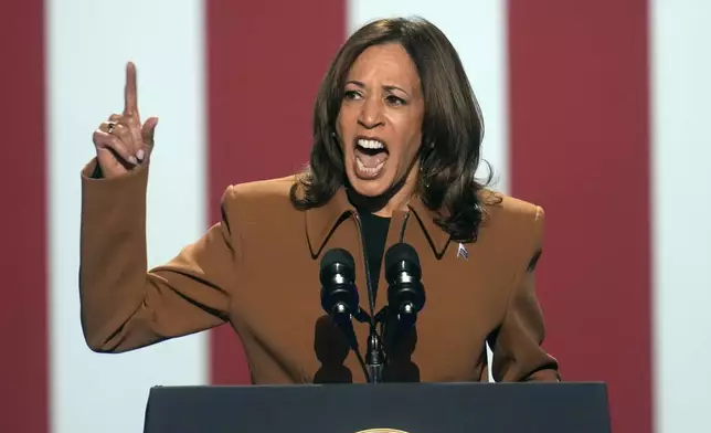 Democratic presidential nominee Vice President Kamala Harris speaks at a campaign rally at the Wings Event Center, Saturday, Oct. 26, 2024, in Kalamazoo, Mich. (AP Photo/Paul Sancya)