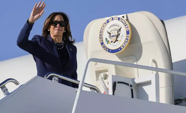 Democratic presidential nominee Vice President Kamala Harris boards Air Force Two in Las Vegas, Monday, Sept. 30, 2024, en route to Washington. (AP Photo/Carolyn Kaster)