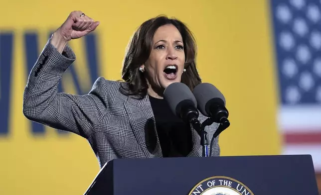 Democratic presidential nominee Vice President Kamala Harris speaks at a campaign event in Burns Park Monday, Oct. 28, 2024, in Ann Arbor, Mich. (AP Photo/Paul Sancya)