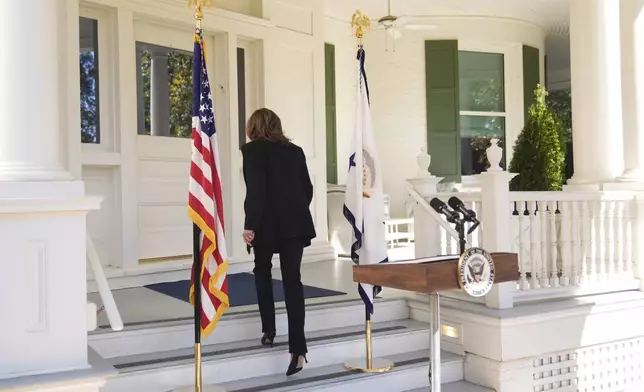 Democratic presidential nominee Vice President Kamala Harris leaves after speaking at the vice president's residence in Washington, Wednesday, Oct. 23, 2024. (AP Photo/Mark Schiefelbein)