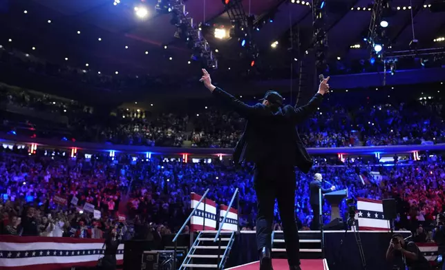 Elon Musk arrives to speak a campaign rally for Republican presidential nominee former President Donald Trump at Madison Square Garden, Sunday, Oct. 27, 2024, in New York. (AP Photo/Julia Demaree Nikhinson)