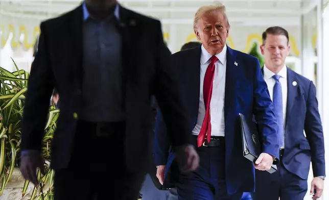 Republican presidential nominee former President Donald Trump arrives to a campaign event at his Mar-a-Lago estate, Tuesday, Oct. 29, 2024, in Palm Beach, Fla. (AP Photo/Julia Demaree Nikhinson)