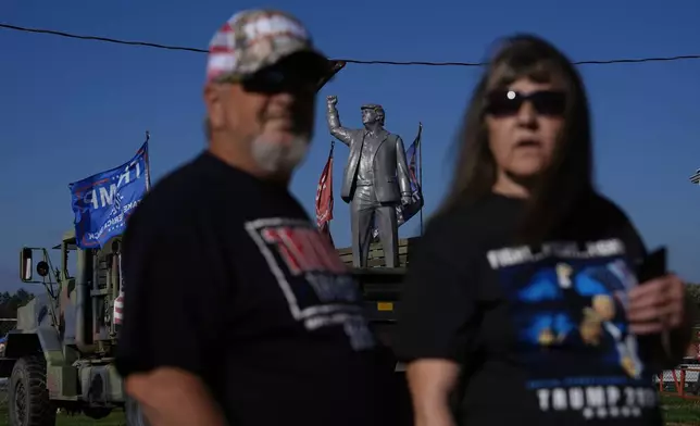 Supporters arrive before Republican presidential nominee former President Donald Trump speaks at a campaign rally at the Butler Farm Show, Saturday, Oct. 5, 2024, in Butler, Pa. (AP Photo/Julia Demaree Nikhinson)