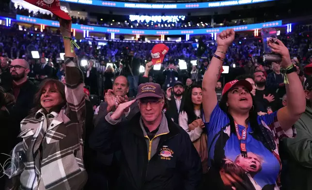 Attendees cheer at a campaign rally for Republican presidential nominee former President Donald Trump at Madison Square Garden, Sunday, Oct. 27, 2024, in New York. (AP Photo/Julia Demaree Nikhinson)