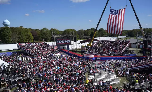 Supporters arrive before Republican presidential nominee former President Donald Trump speaks at a campaign event at the Butler Farm Show, Saturday, Oct. 5, 2024, in Butler, Pa. (AP Photo/Alex Brandon)