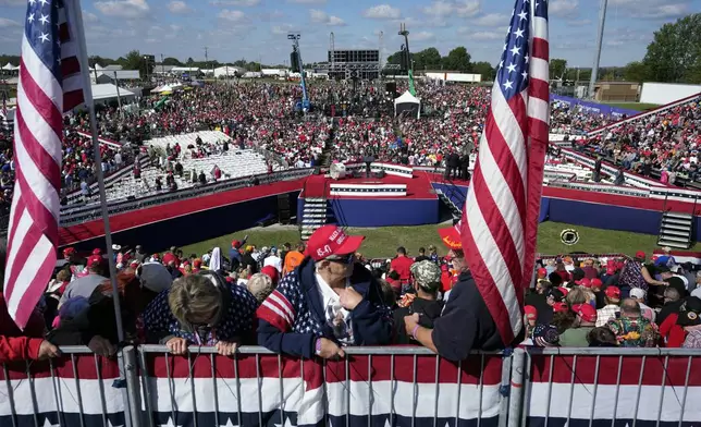 Supporters arrive before Republican presidential nominee former President Donald Trump speaks at a campaign rally at the Butler Farm Show, the site where a gunman tried to assassinate him in July, Saturday, Oct. 5, 2024, in Butler, Pa. (AP Photo/Alex Brandon)