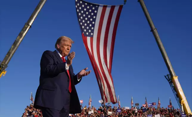 Republican presidential nominee former President Donald Trump arrives at a campaign rally at the Butler Farm Show, Saturday, Oct. 5, 2024, in Butler, Pa. (AP Photo/Evan Vucci)