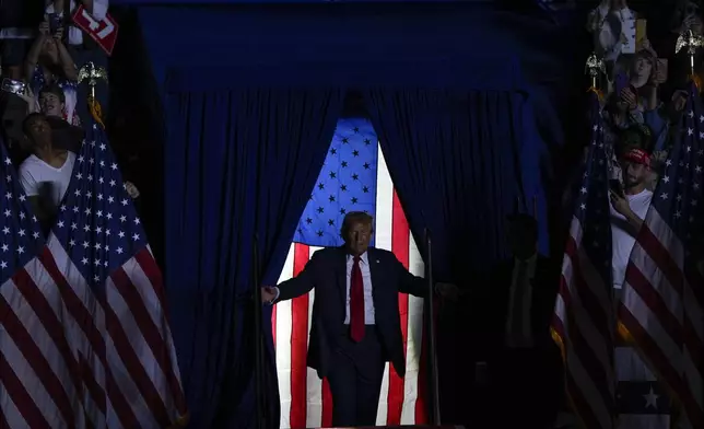 Republican presidential nominee former President Donald Trump arrives at a campaign rally at McCamish Pavilion Monday, Oct. 28, 2024, in Atlanta, Ga. (AP Photo/Julia Demaree Nikhinson)