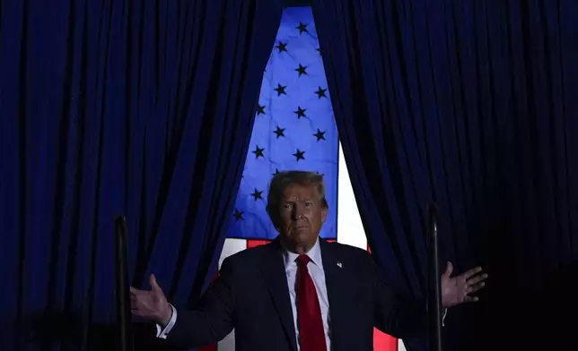 Republican presidential nominee former President Donald Trump arrives at a campaign rally at McCamish Pavilion Monday, Oct. 28, 2024, in Atlanta, Ga. (AP Photo/Julia Demaree Nikhinson)