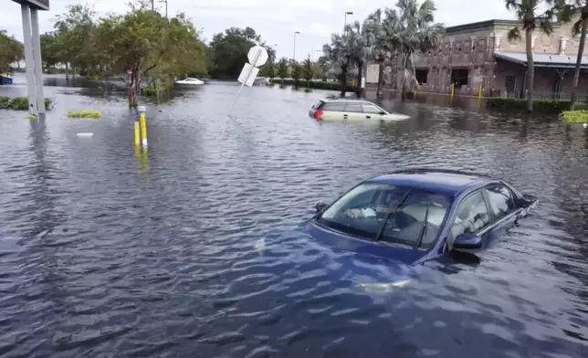 This drone image provided by Kairat Kassymbekov shows flooding from Hurricane Milton in Tampa, Fla., Thursday, Oct. 10, 2024. (Kairat Kassymbekov via AP)