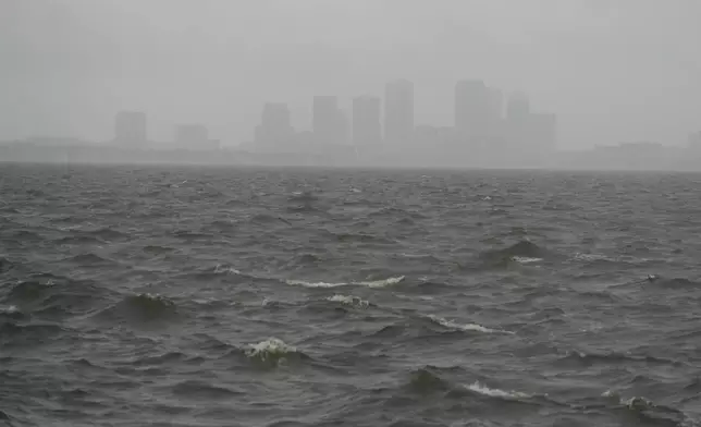 Rain begins to fall ahead of the arrival of Hurricane Milton in Tampa, Fla., Wednesday, Oct. 9, 2024. (AP Photo/Julio Cortez)