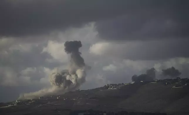 Smoke rises following Israeli bombardment in southern Lebanon as seen from northern Israel, Tuesday, Oct. 1, 2024. (AP Photo/Leo Correa)