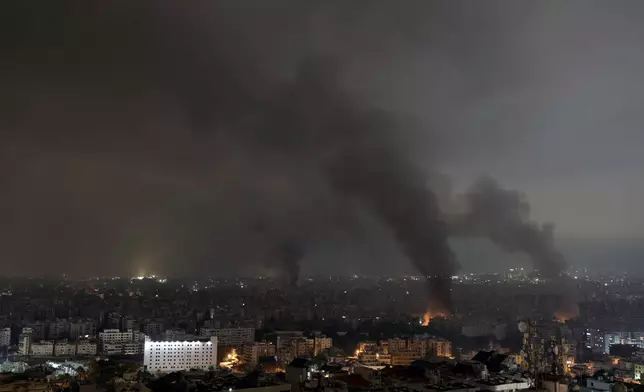 Flames and smoke rise from an Israeli airstrike in Dahiyeh, Beirut, Lebanon, early Monday, Oct. 7, 2024. (AP Photo/Bilal Hussein)