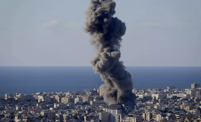Smoke rises from an Israeli airstrike on Dahiyeh, in the southern suburb of Beirut, Lebanon, Saturday, Oct. 19, 2024. (AP Photo/Hussein Malla)