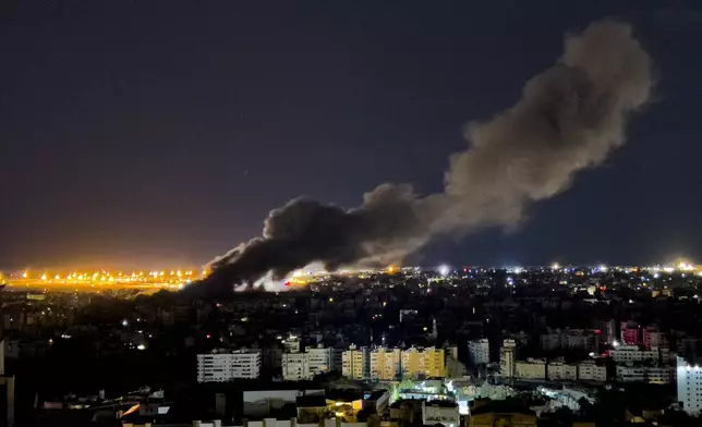 Smoke rises from an Israeli airstrike that hit the southern suburb of Beirut, Lebanon, Tuesday, Oct. 1, 2024. (AP Photo/Hussein Malla)